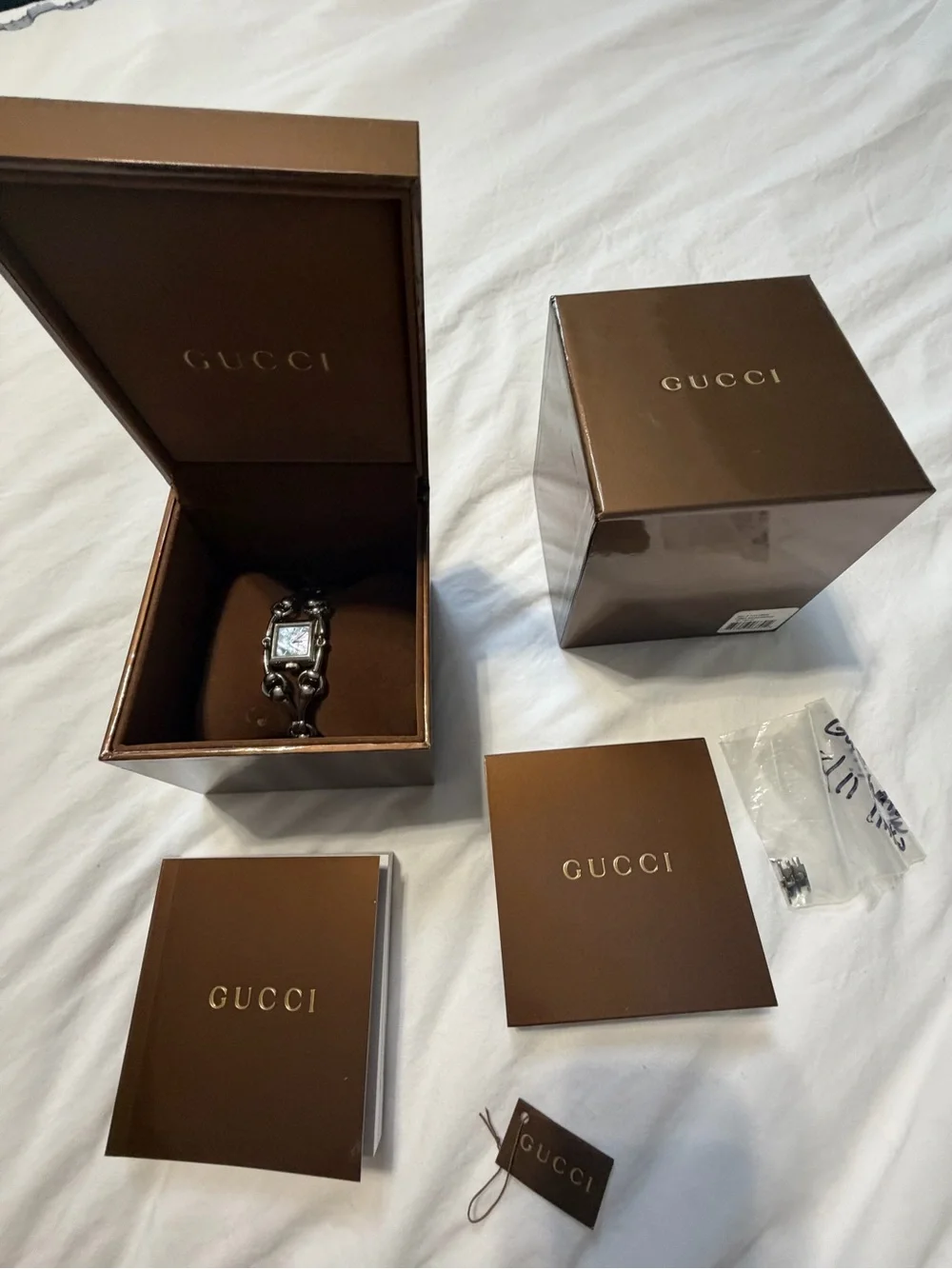 Gucci Signiora horsebit watch silver with blue mother of pearl face